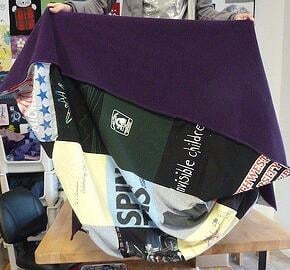 fleece on the back of a T-shirt blanket. This is not a quilt.